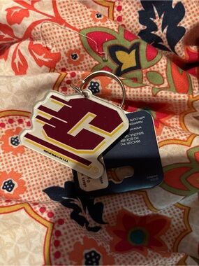 Wincraft Maroon and Gold Keychain - Stylized Letter Logo
